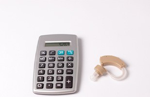 Calculator next to hearing aid