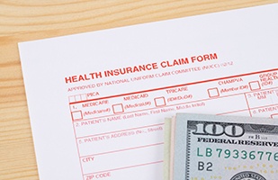 Health insurance claim form and cash