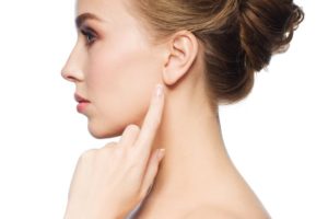 Your facial plastic surgeon in Chicago will repair your earlobes.